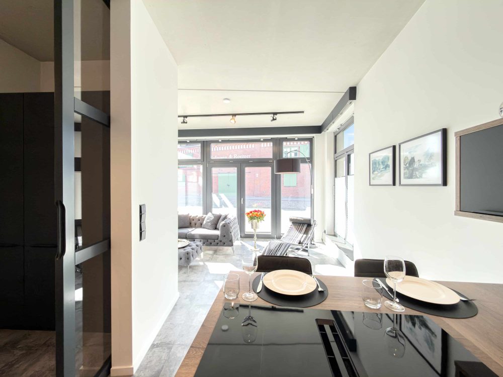 Offener Küchen- und Wohnbereich im ELBE.6 Apartment I in Wittenberge