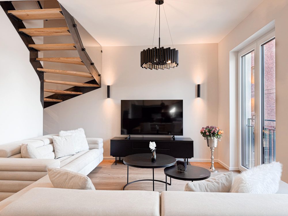 Weitere Ansicht des Wohnzimmers im ELBE.6 Apartment III in Wittenberge