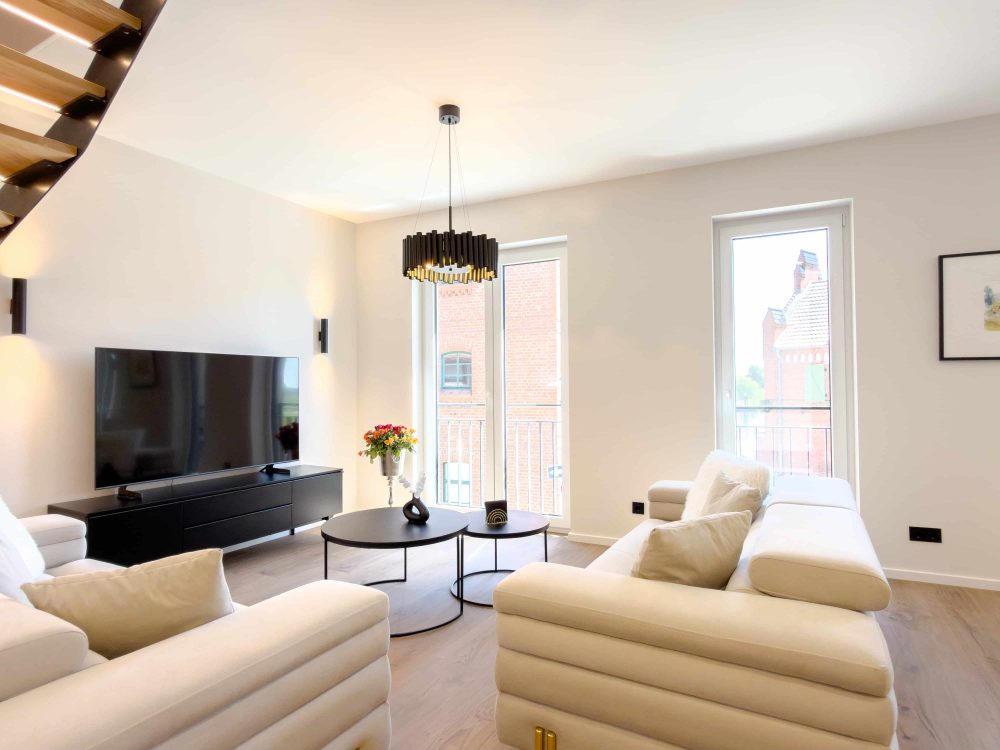 Wohnzimmer im ELBE.6 Apartment III in Wittenberge